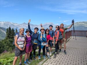 Happy hikers at the end of the Tour du Mont Blanc West